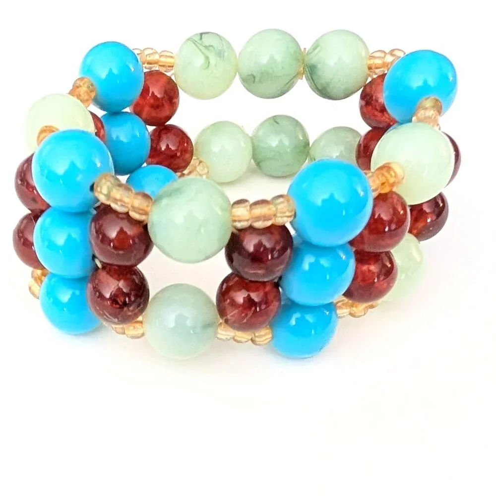 Blue, amber, green and pale yellow beaded stretch bracelet
